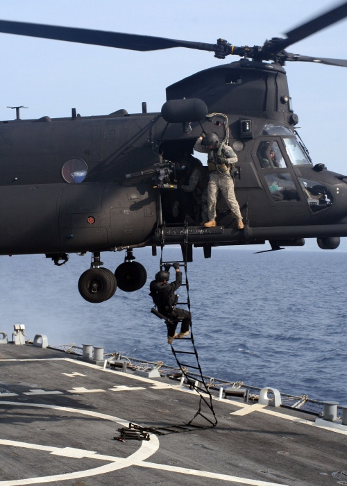 21 September 2009, ADRIATIC SEA - Special operations forces descend a Jacob's ladder from an MH-47 Chinook helicopter, assigned to the 160th Special Operations Aviation Regiment (Airborne), onto the guided-missile destroyer USS Higgins (DDG 76) during Jackal Stone 2009. Jackal Stone is a series of training exercises in various locations throughout Croatia to promote cooperation and interoperability between the special operations forces of the 10 participating nations.