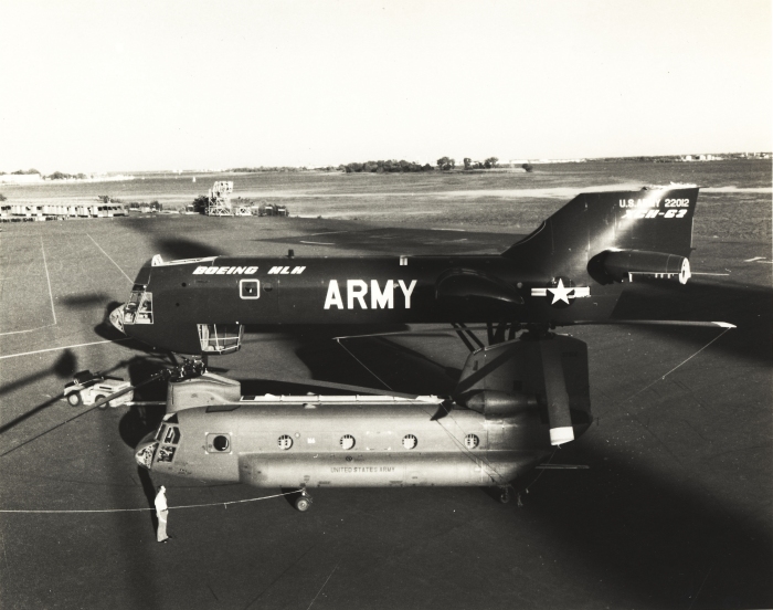 Taken at an unknown location, CH-47A Chinook helicopter 63-07902 sits parked next to the future Heavy Lift Helicopter (HLH) or XCH-62 prototype in this undated photograph.