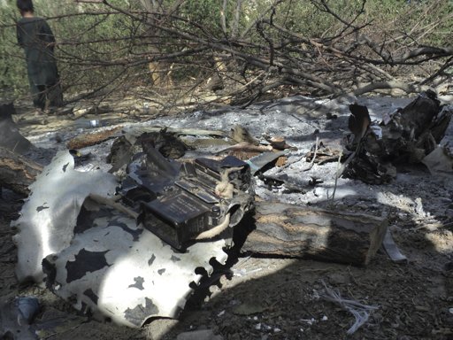 Wreckage of CH-47D Chinook helicopter 84-24175 shot down on 5 Aug 2011 is seen at the site of crash at Tangi Valley in Wardak province some 60 miles (97 kilometers) southwest of Kabul, Afghanistan. The Chinook helicopter that insurgents shot down burst into flames before hitting the ground, leaving wreckage scattered on both sides of a river in eastern Afghanistan. This photograph was taken on 11 August 2011 after the U.S. Military destroyed the remains of the aircraft with explosives and hauled away most of the debris left over by ground vehicles.