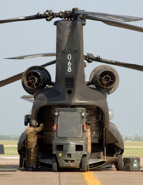 Boeing CH-47D helicopter 88-00068 transporting internal cargo at an unknown location on an unknown date.