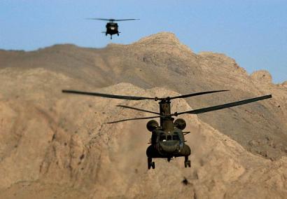 A U.S. Army CH-47D Chinook and his little buddy.