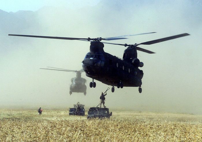 An infantryman connects a humvee to a CH-47D Chinook helicopter during an operation in the Argandab Valley of south central Afghanistan. The Soldier is assigned to the 25th Infantry Division's 2nd Battalion, 35th Infantry Regiment, and the helicopters are operated by crews of Company F, 131st Aviation Regiment, Alabama Army National Guard.