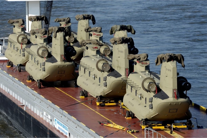 Spring 2011: "Big Windy" - a United States Army Chinook helicopter unit based in Germany - will soon receive brand new CH-47F Chinook helicopters. Floating up the Rhein River near Nijmegen on a barge are six of these advanced and versatile flying machines.