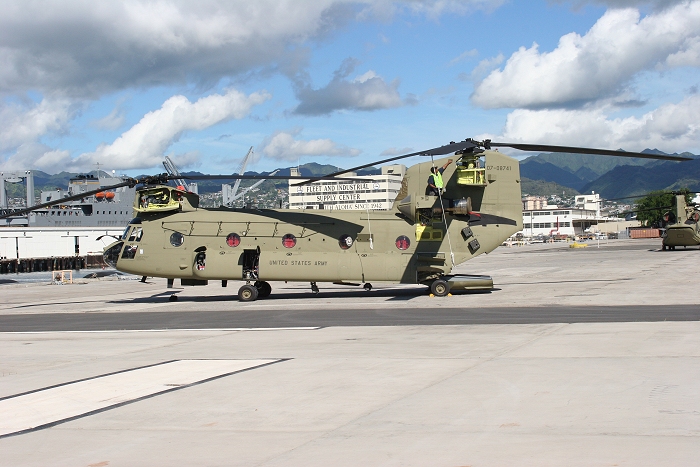 19 November 2010: CH-47F Chinook helicopter 07-08741 gets a preflight by the S3 NET Team as the Boeing Maintenance Team completes some final assembly tasks.