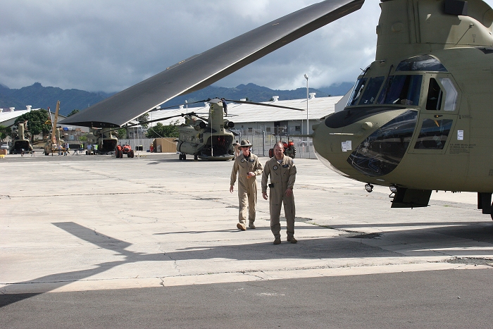 20 November 2010: S3 NET Team CH-47F Chinook helicopter pilots Clayton Webster (left) and "Z" Szumigala (curiously with no hat) walk past 09-08065 on their way to somewhere.