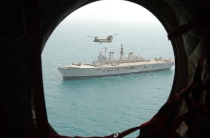 A Chinook takes off from the flight deck of HMS Ark Royal.